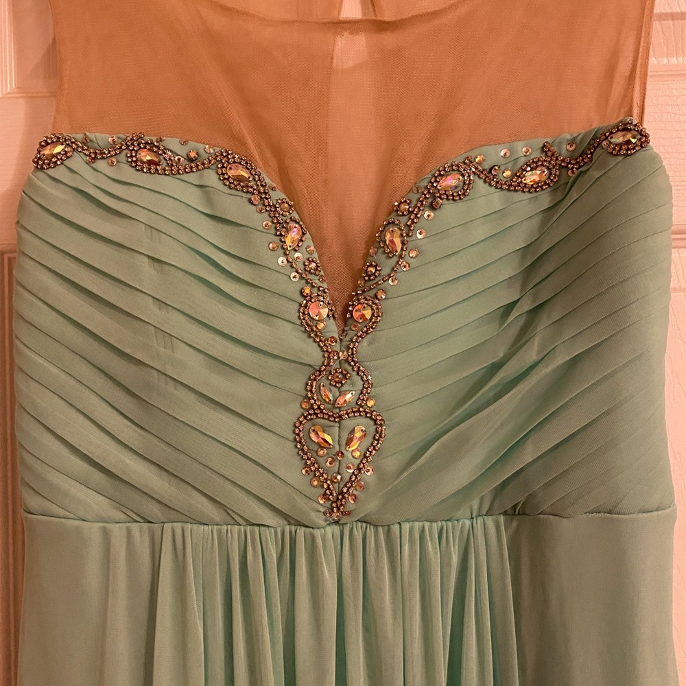 Teal formal gown with embellishment